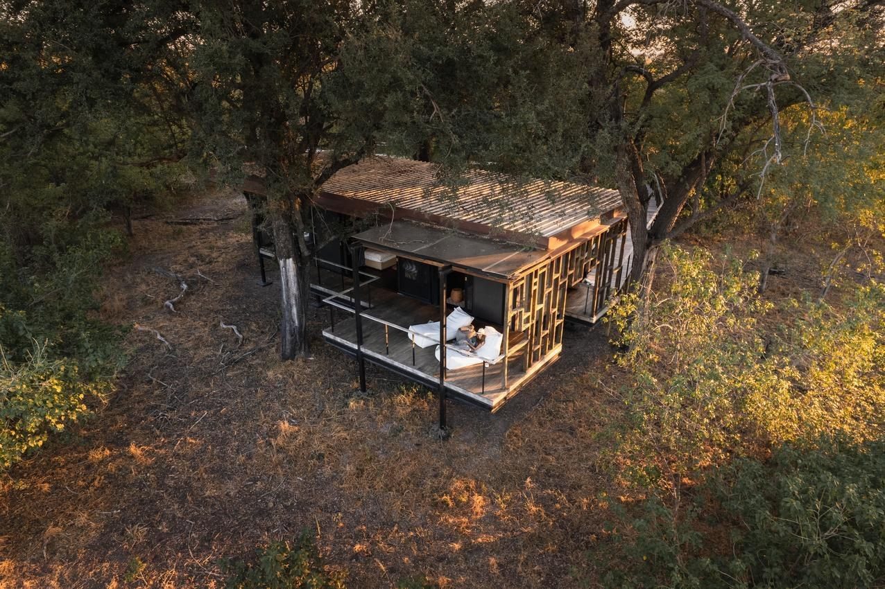 Seen from above, a Qorokwe Camp suite with slatted screens and an open deck